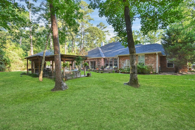 ranch-style home with a patio and a front yard