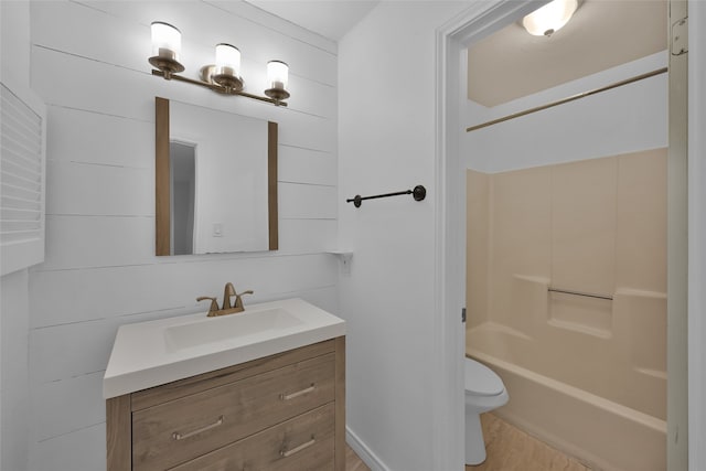 full bathroom with bathtub / shower combination, vanity, and toilet