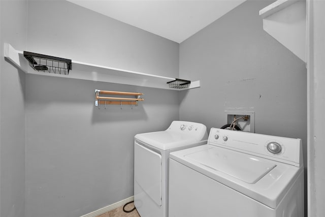 laundry room featuring washer and clothes dryer