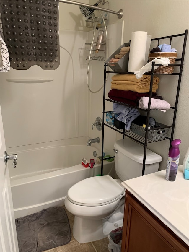 full bathroom with toilet, vanity, tile patterned floors, and shower / bathing tub combination