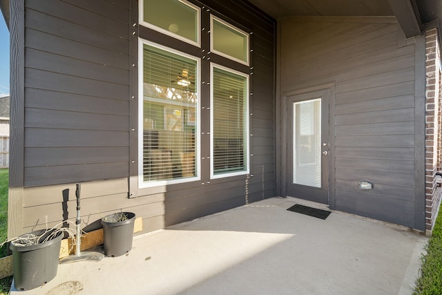 doorway to property featuring a patio