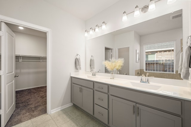 bathroom featuring vanity and tile patterned flooring