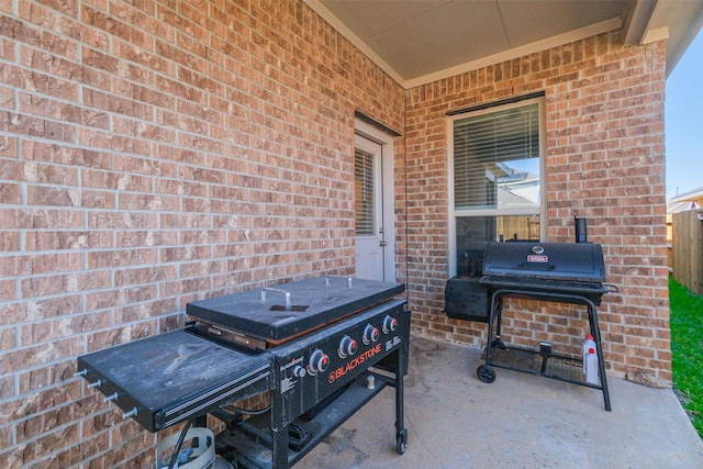 view of patio with a grill