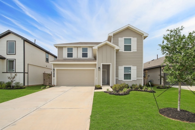 view of front of home featuring a garage and a front lawn