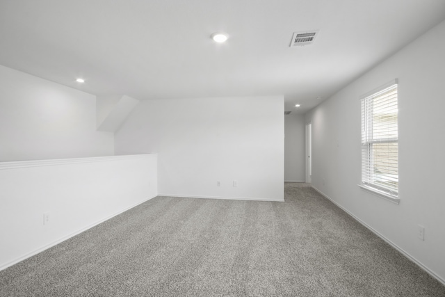 bonus room with carpet