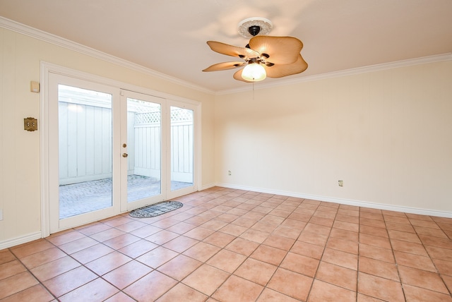 unfurnished room with ornamental molding, ceiling fan, and baseboards