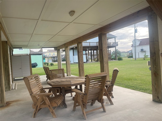 sunroom / solarium featuring a paneled ceiling