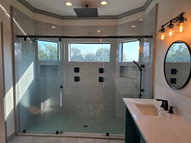 bathroom featuring tile patterned floors, a shower with shower door, and ornamental molding