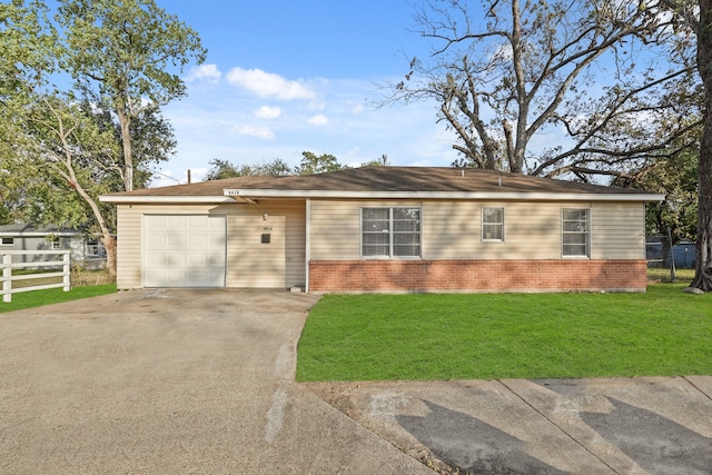 ranch-style house with a front lawn and a garage