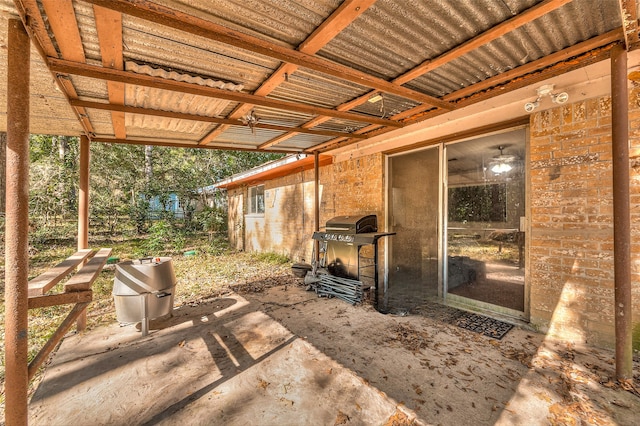 view of patio featuring a grill