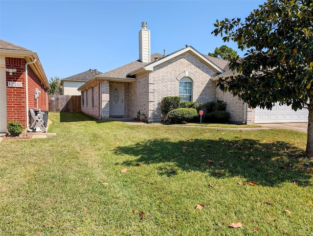 exterior space with a front lawn and a garage