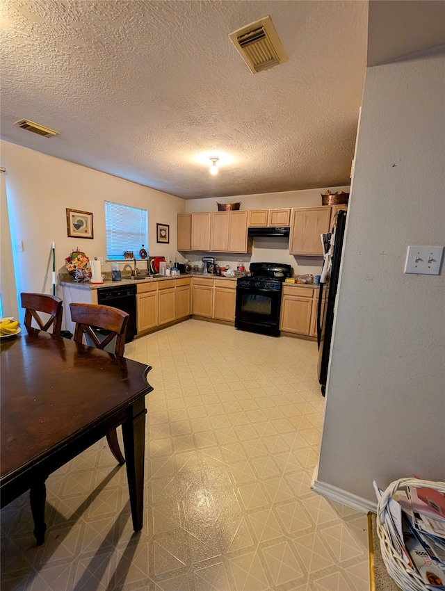 kitchen with exhaust hood, sink, black appliances, light brown cabinetry, and a textured ceiling