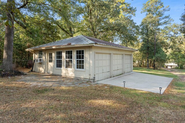 garage with a lawn