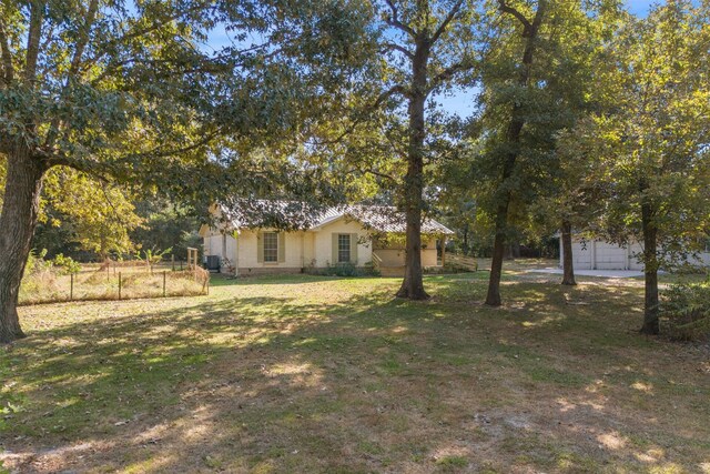 view of yard with a garage