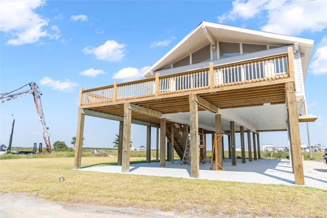 view of property's community with a yard, a patio, and a deck