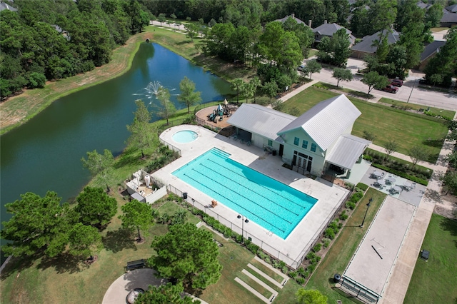 birds eye view of property featuring a water view