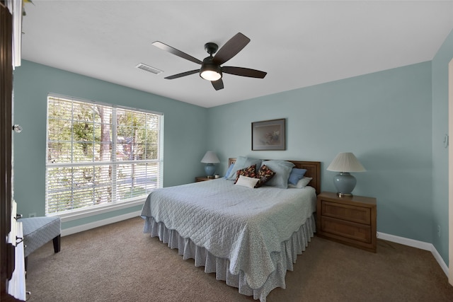 carpeted bedroom with ceiling fan