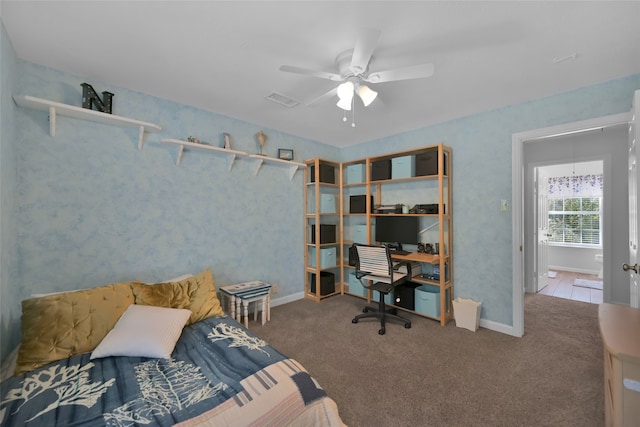 carpeted bedroom featuring ceiling fan