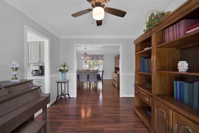 interior space with ceiling fan with notable chandelier, crown molding, and dark hardwood / wood-style floors