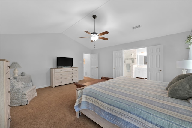 bedroom with ensuite bath, lofted ceiling, carpet floors, and ceiling fan