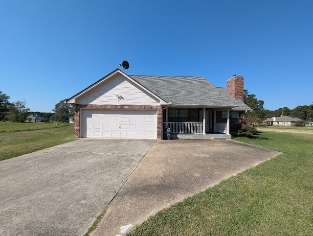 ranch-style home with a front yard, a garage, and covered porch