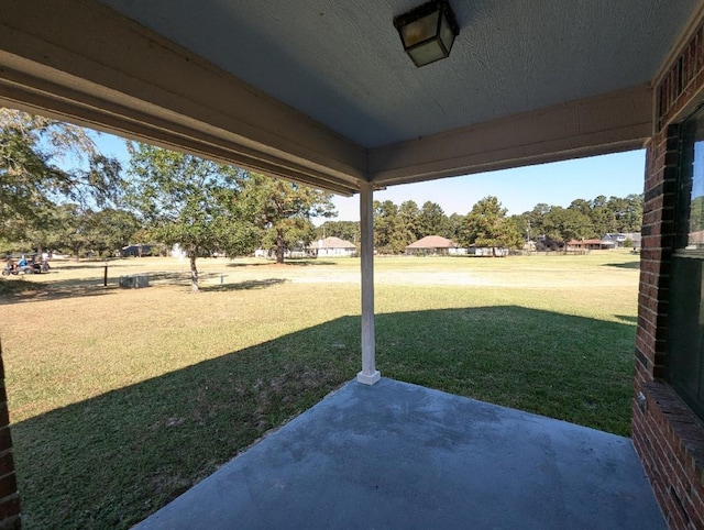 view of yard with a patio area