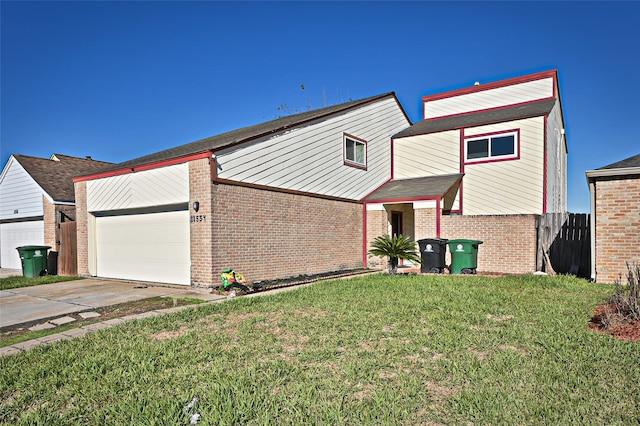 view of front facade featuring a garage and a front lawn