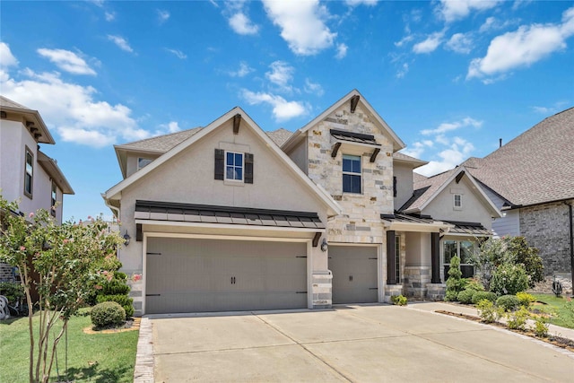 view of front of home with a front lawn and a garage