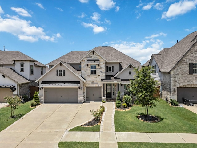 view of front of home with stone siding, concrete driveway, a front yard, and a residential view