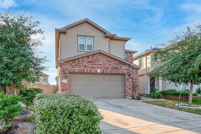 view of front of property with a garage