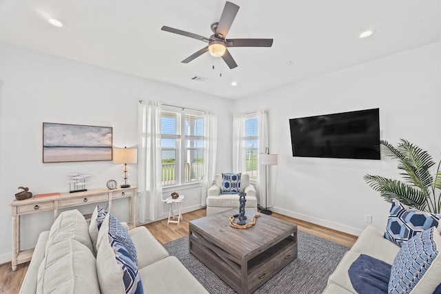 26831 Bay Water Dr, Galveston, TX 77554 - living room with ceiling fan, wood finished floors, and visible vents