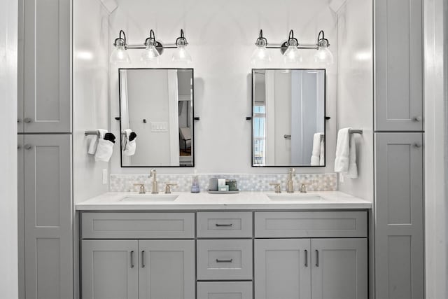 26831 Bay Water Dr, Galveston, TX 77554 - full bathroom featuring double vanity and a sink