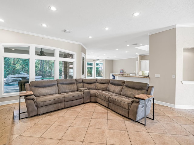 living room featuring light tile patterned flooring, recessed lighting, visible vents, a ceiling fan, and ornamental molding