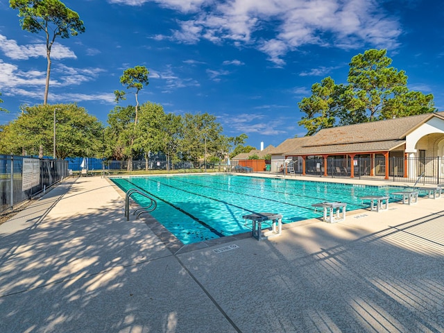 community pool with fence