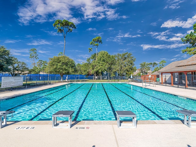 community pool with fence