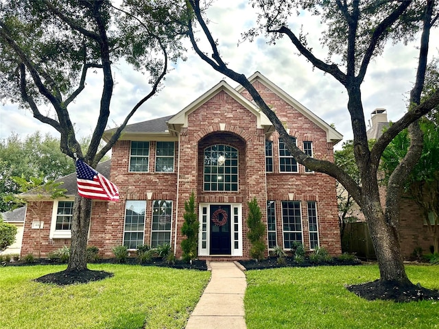 view of front facade with a front lawn