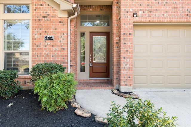 property entrance with a garage