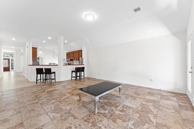 interior space featuring lofted ceiling