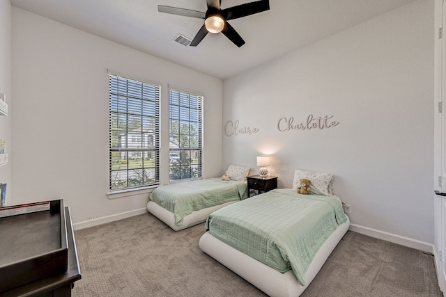 carpeted bedroom featuring ceiling fan