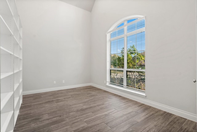 spare room featuring hardwood / wood-style floors