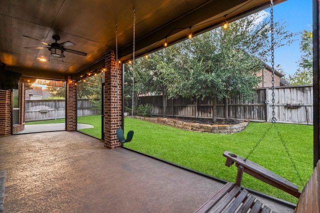 exterior space featuring ceiling fan