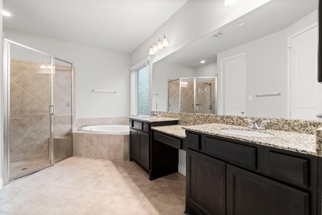 bathroom with separate shower and tub, tile patterned floors, and vanity