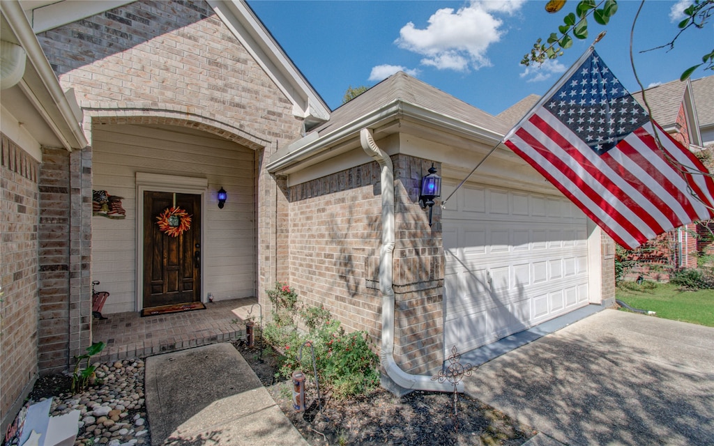 property entrance featuring a garage