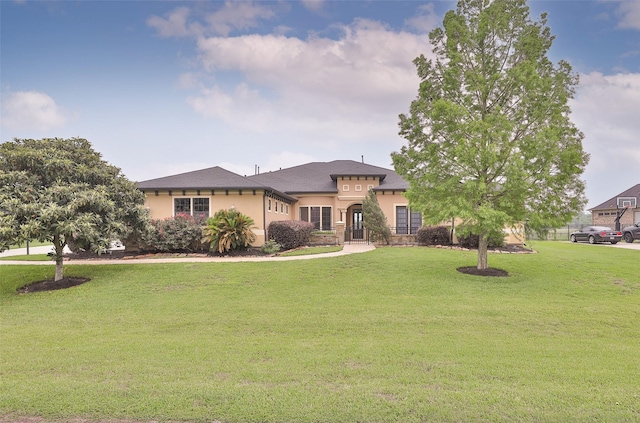 view of front of home with a front yard