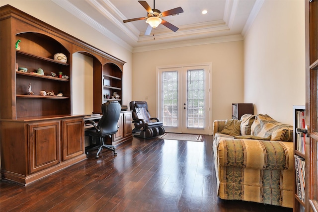 office area featuring ceiling fan, french doors, dark wood-type flooring, crown molding, and a tray ceiling