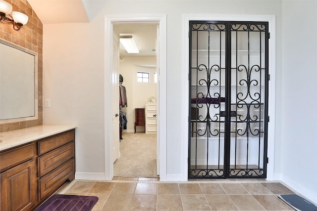 entryway featuring light carpet