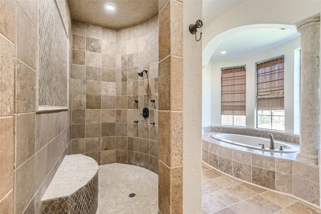 bathroom featuring plus walk in shower