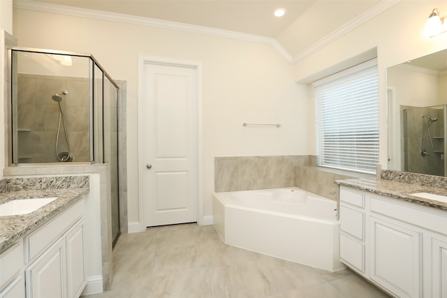 bathroom featuring vanity, ornamental molding, vaulted ceiling, and separate shower and tub