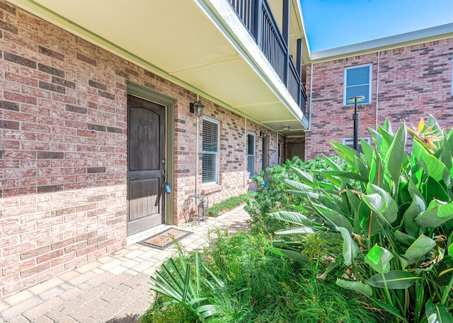 property entrance with a balcony