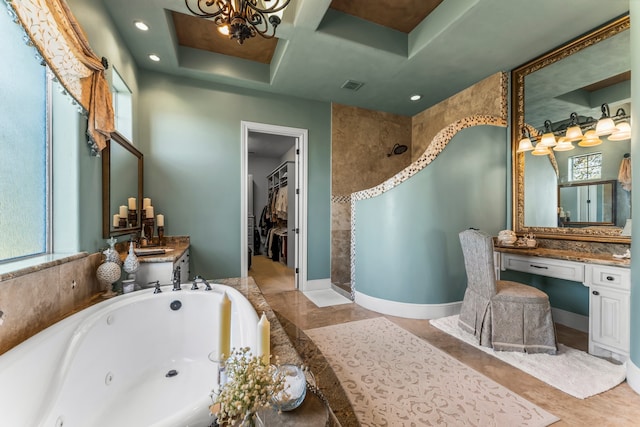 bathroom featuring vanity, a healthy amount of sunlight, and independent shower and bath